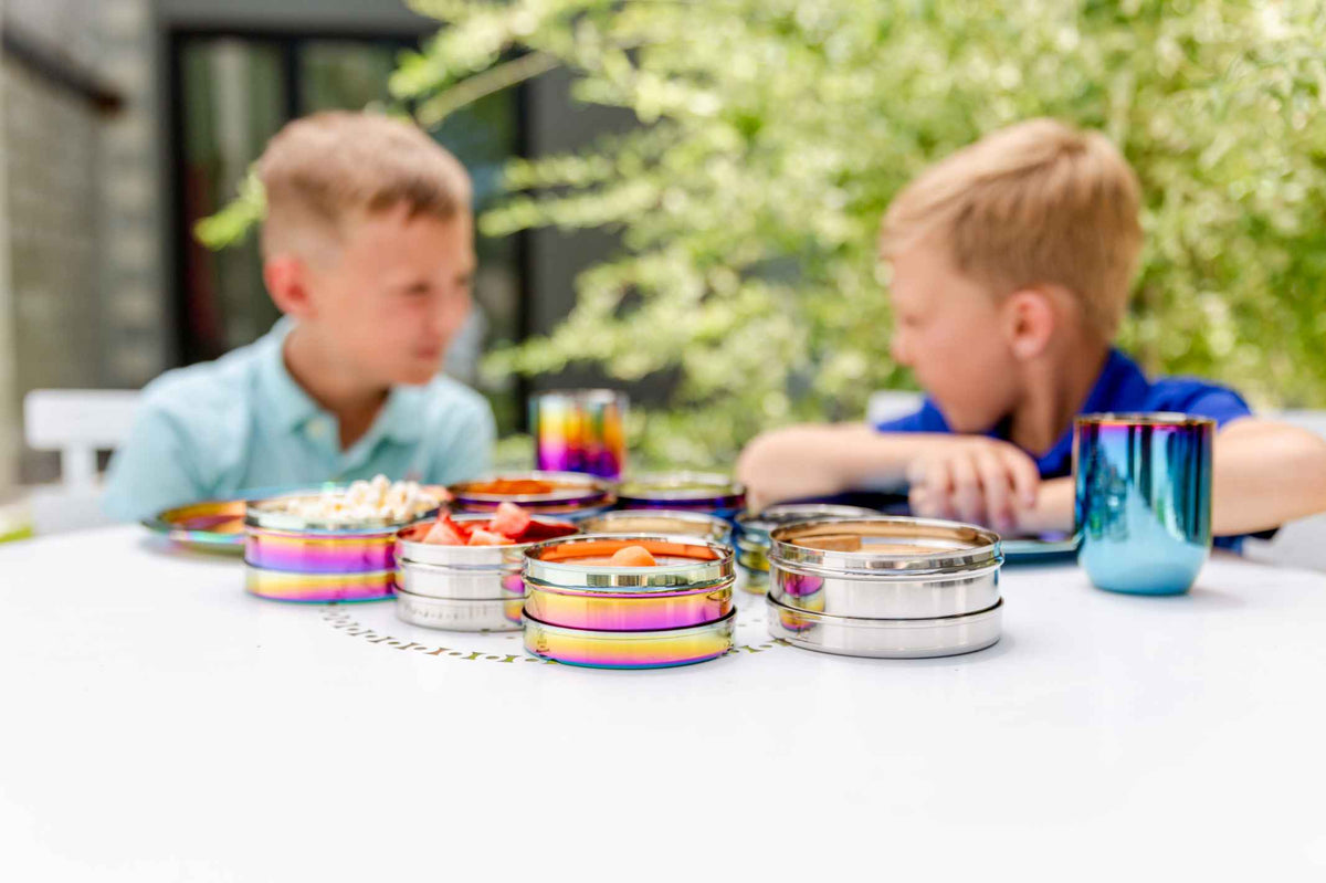 Sustainable Travel Tips | Kids at Table with Packed Snacks