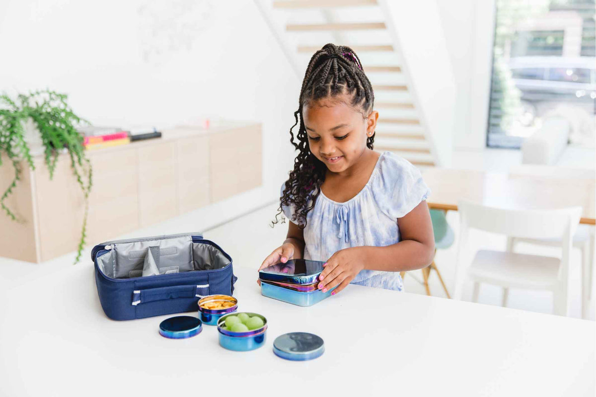 Sustainable Travel Packing Tips | Child Packs Food in Ahimsa Dishes