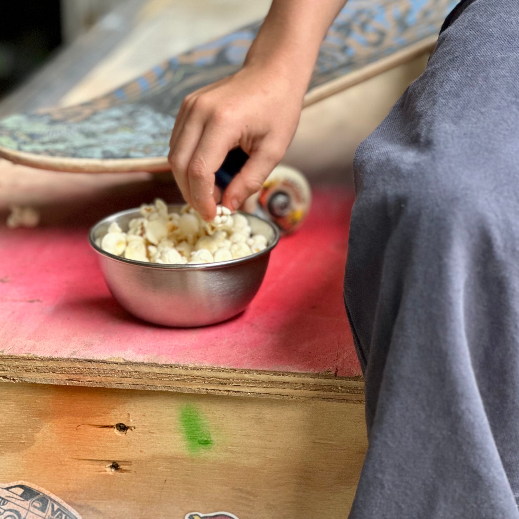 Child eating popcorn from stainless steel 12 ounce bowl