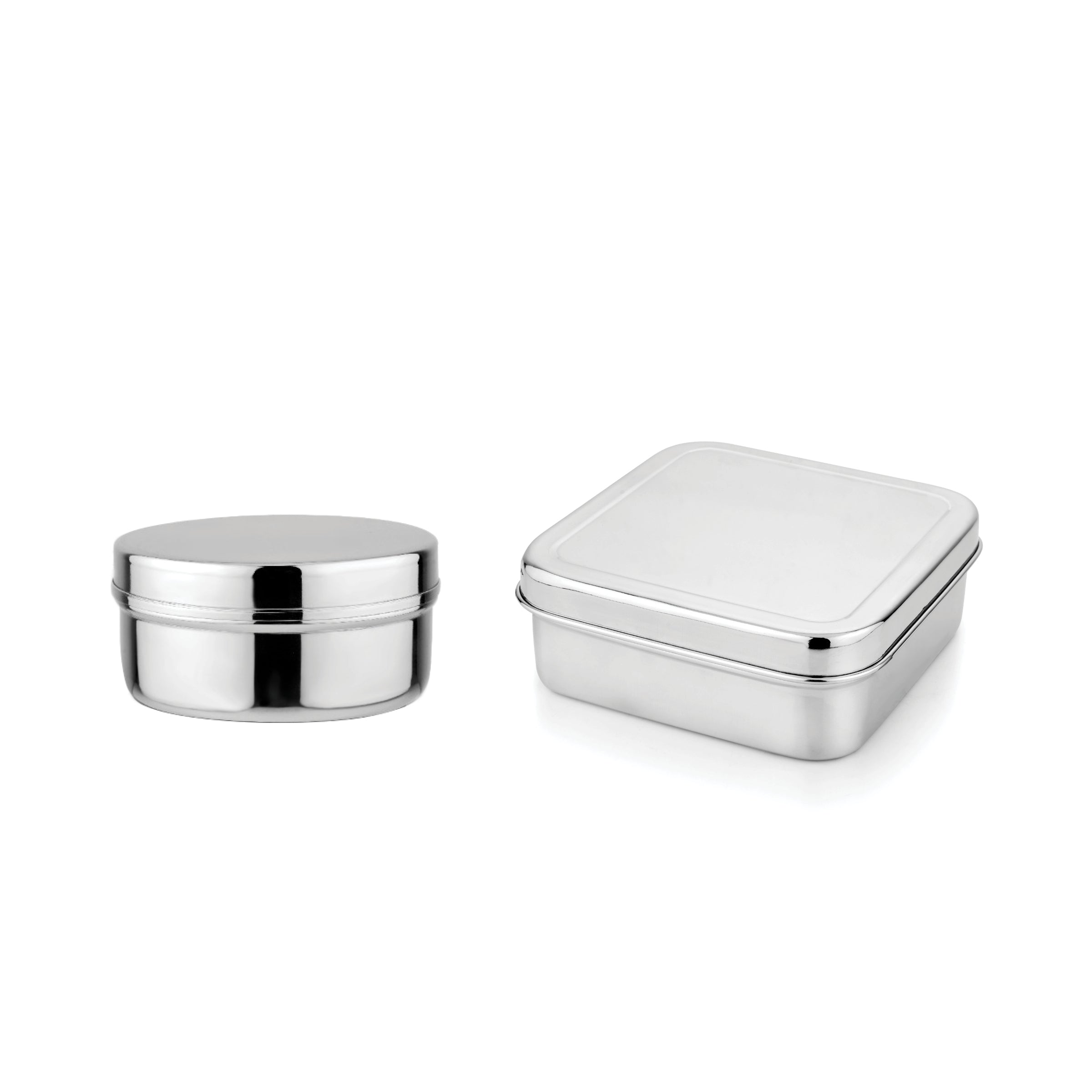 Two silver stainless steel food containers for sandwiches, snacks, fruit, vegetables, pretzels, and more on a white background