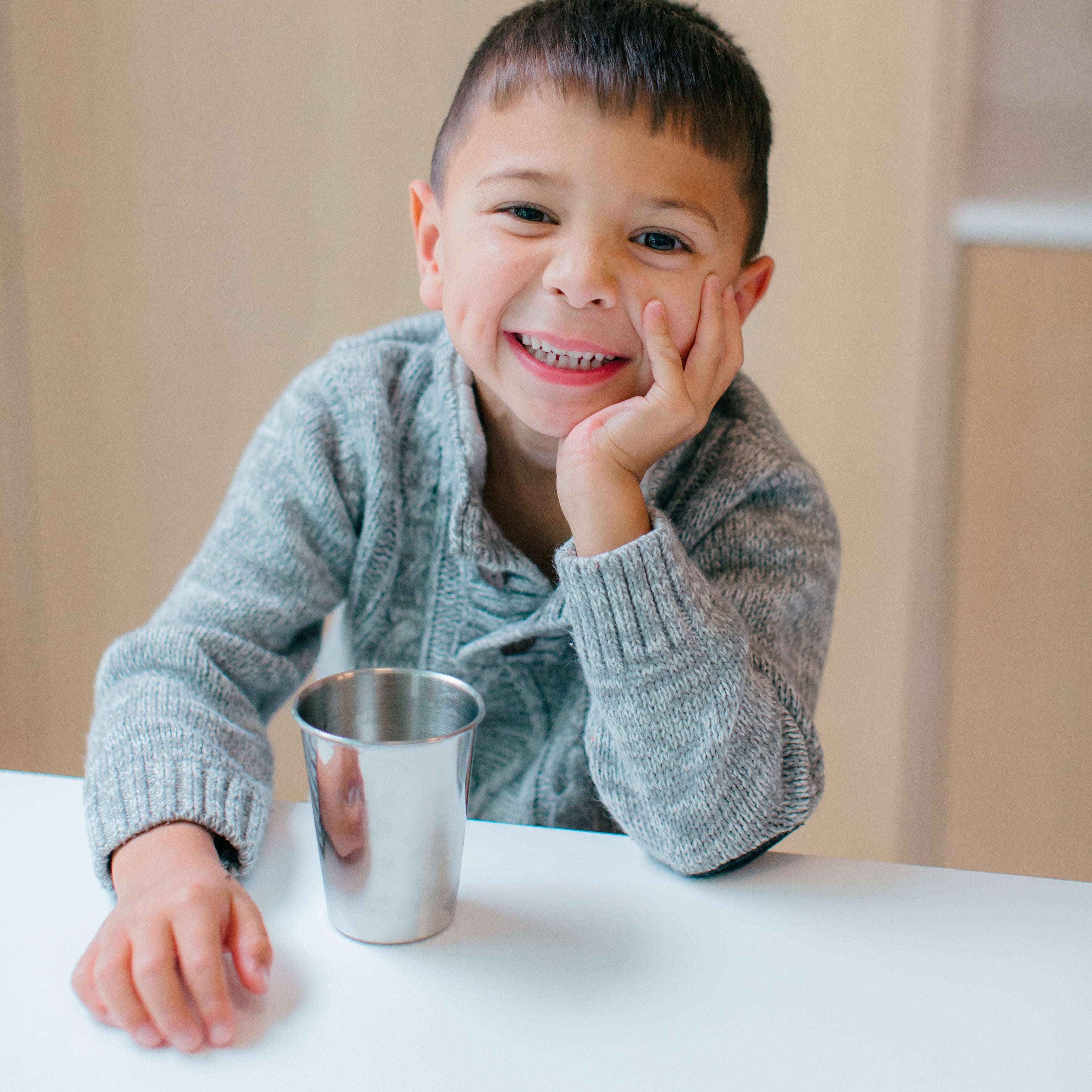 Stainless steel cups for kids. Child with stainless steel kids 10 ounce cup. The sippy cup is not a milestone for kids, it is recommended they go straight from bottle or breast to an open cup.