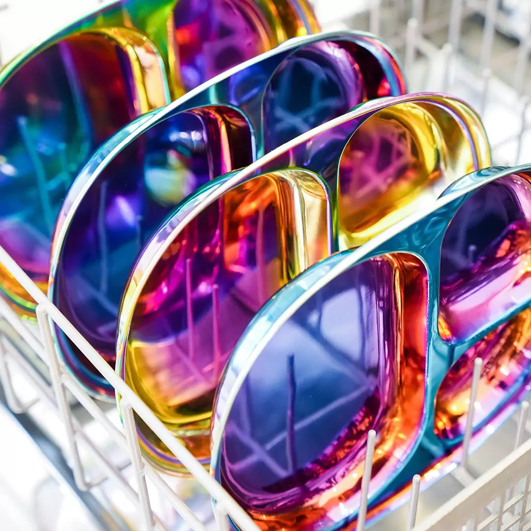 Dishwasher with bright and shiny, clean dishes - 4 Balance Bites Compartment plates in Iridescent-Blue and Rainbow - Ahimsa dishes are dishwasher safe.