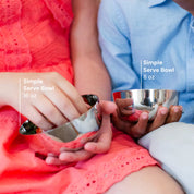 Two children holding Simple Serve Bowls with text indicating size, 16 ounces and 8 ounces