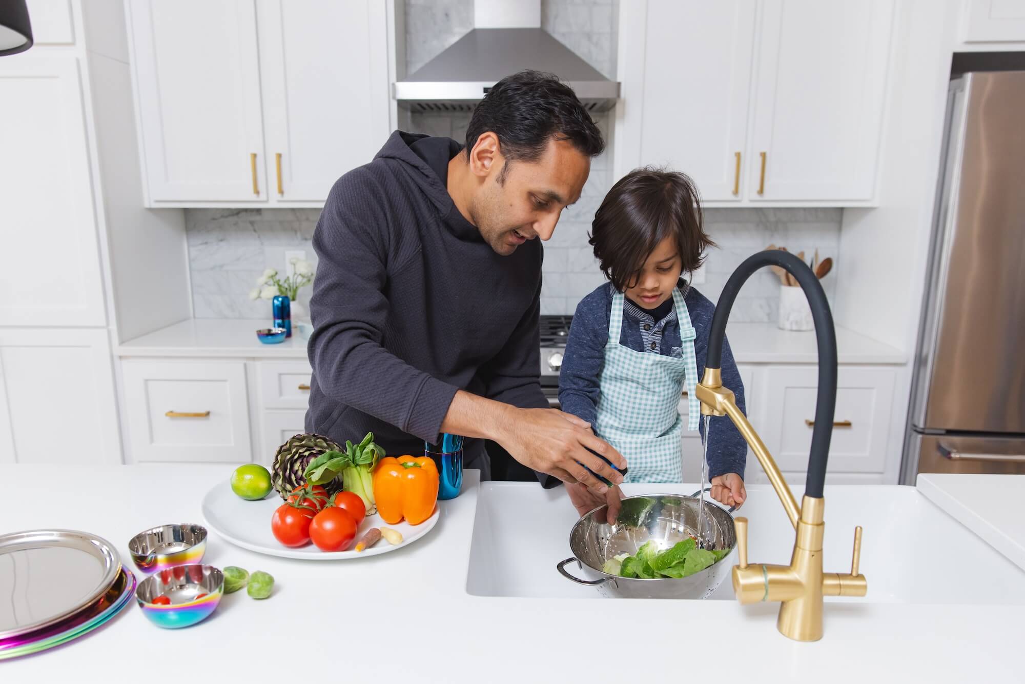 parent and child prepping food