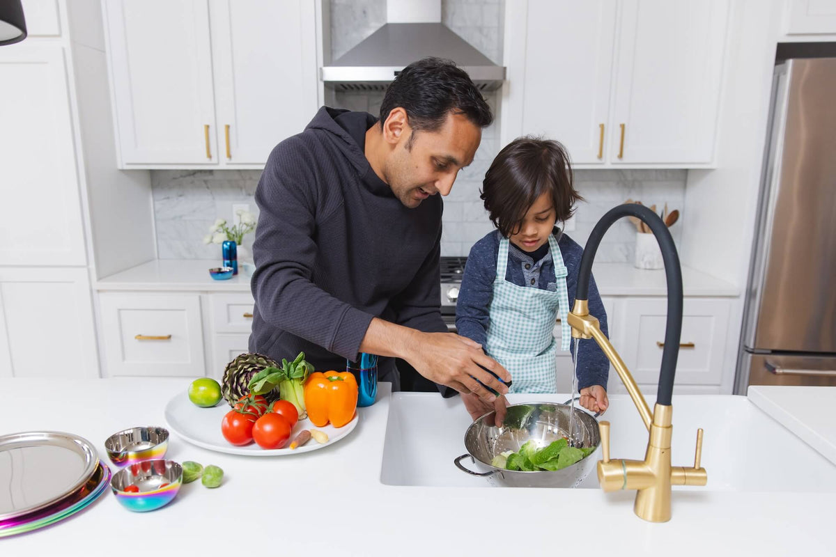 parent and child prepping food