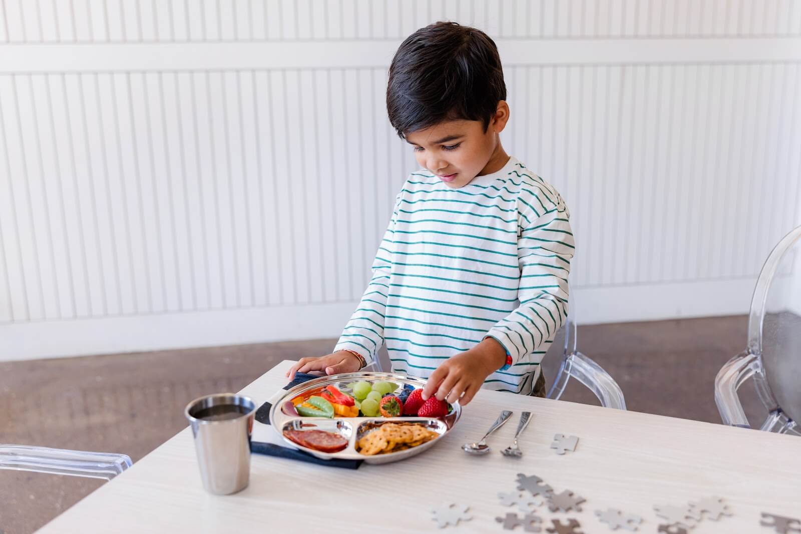 kids eating with stainless steel plates