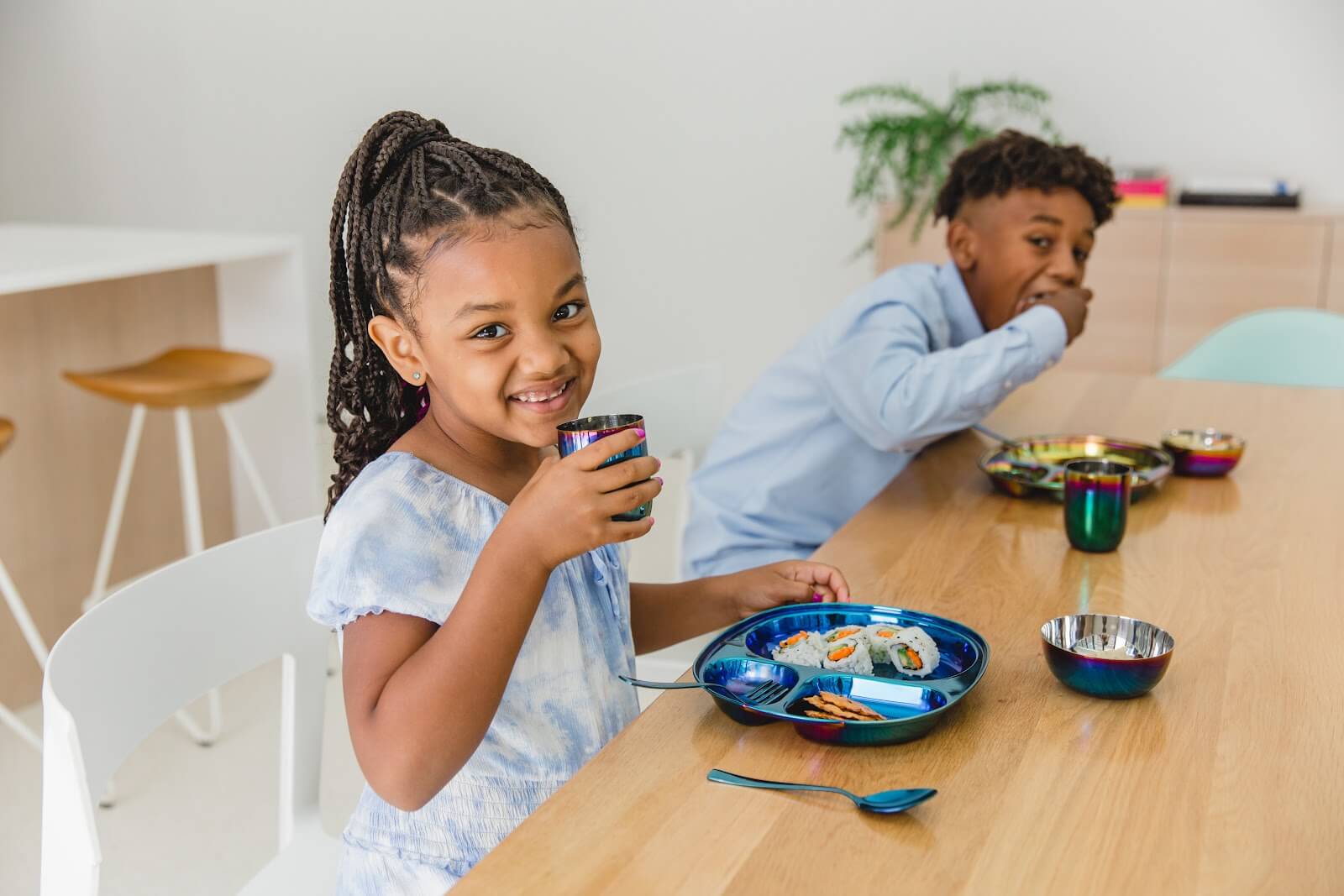 kids eating with stainless steel plates