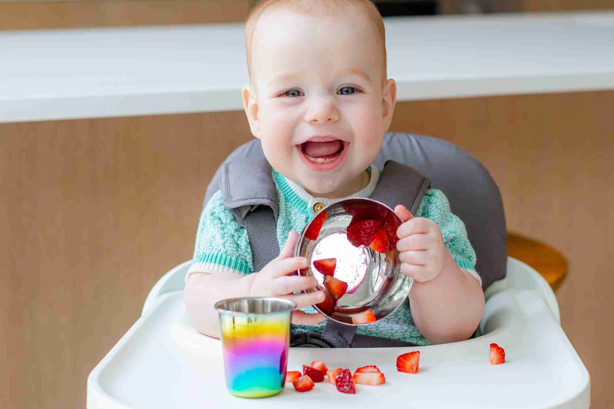 baby eating with stainless steel bowl