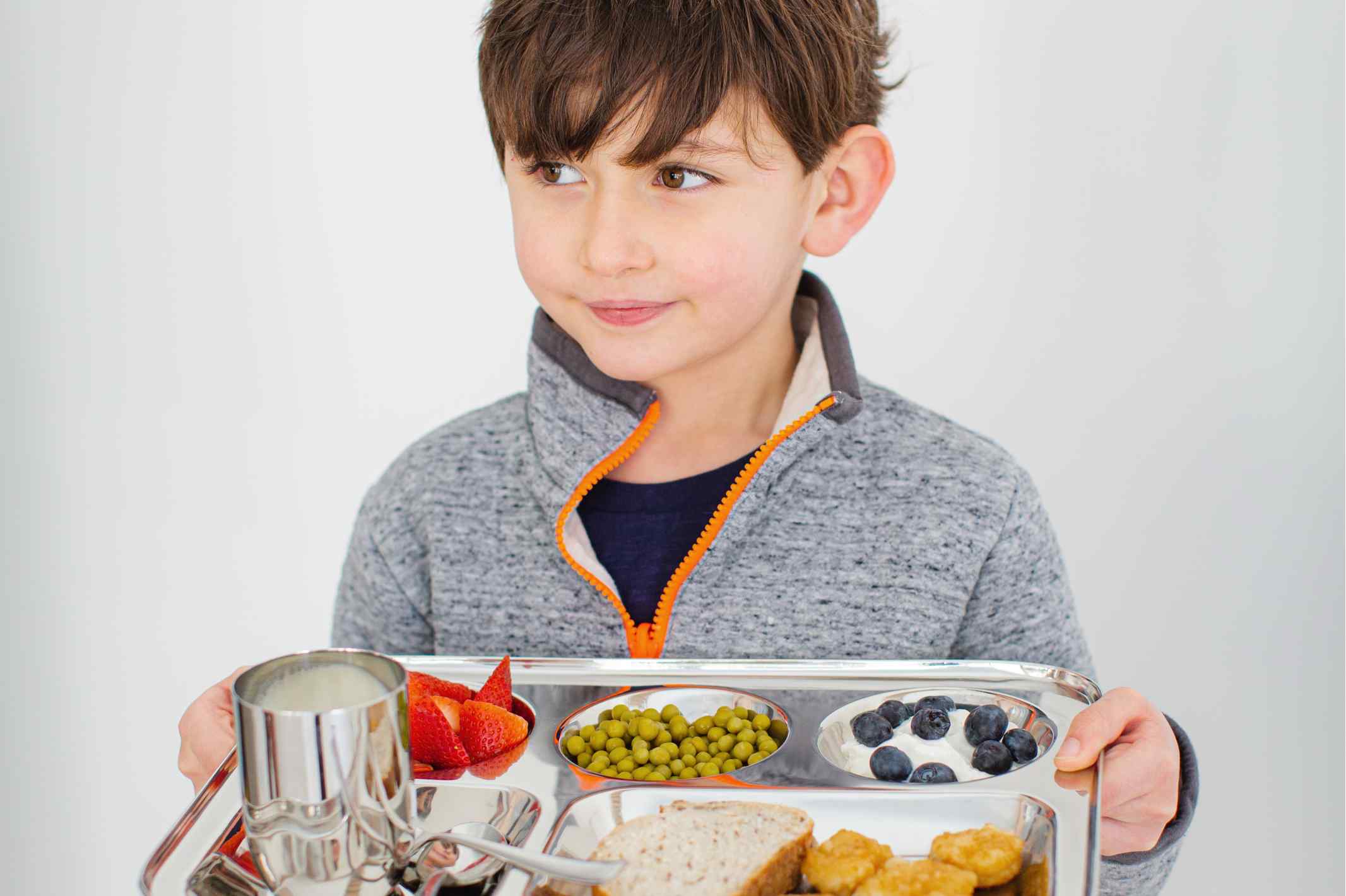 Sustainable School | Child with Tray