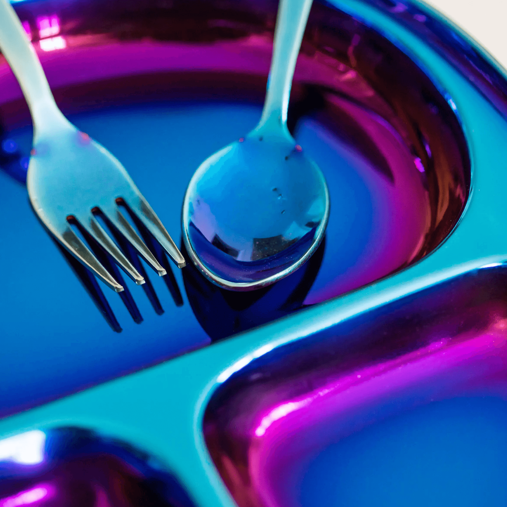 rainbow stainless steel dishes close up