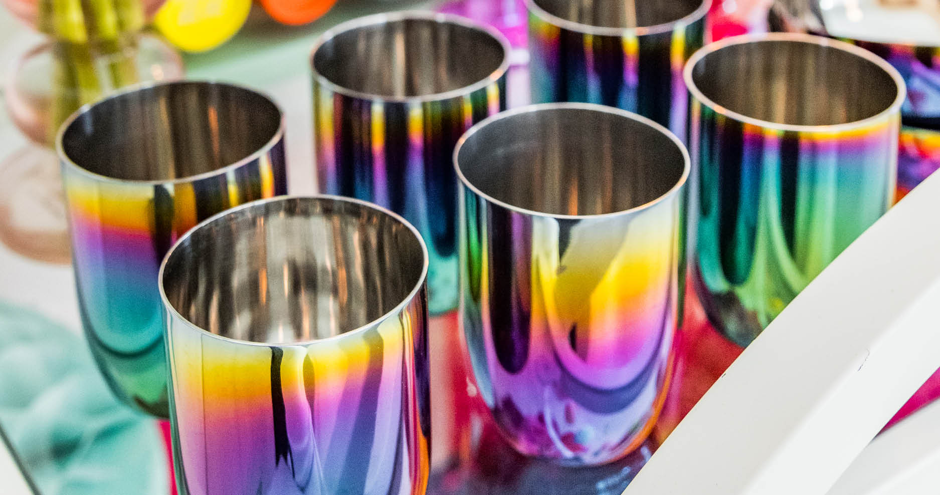 Stainless steel rainbow cups on a holiday party cart