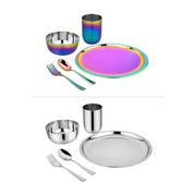 Two sets of stainless steel dinnerware in rainbow and classic including plates, bowls, cups, and utensils on a white background.