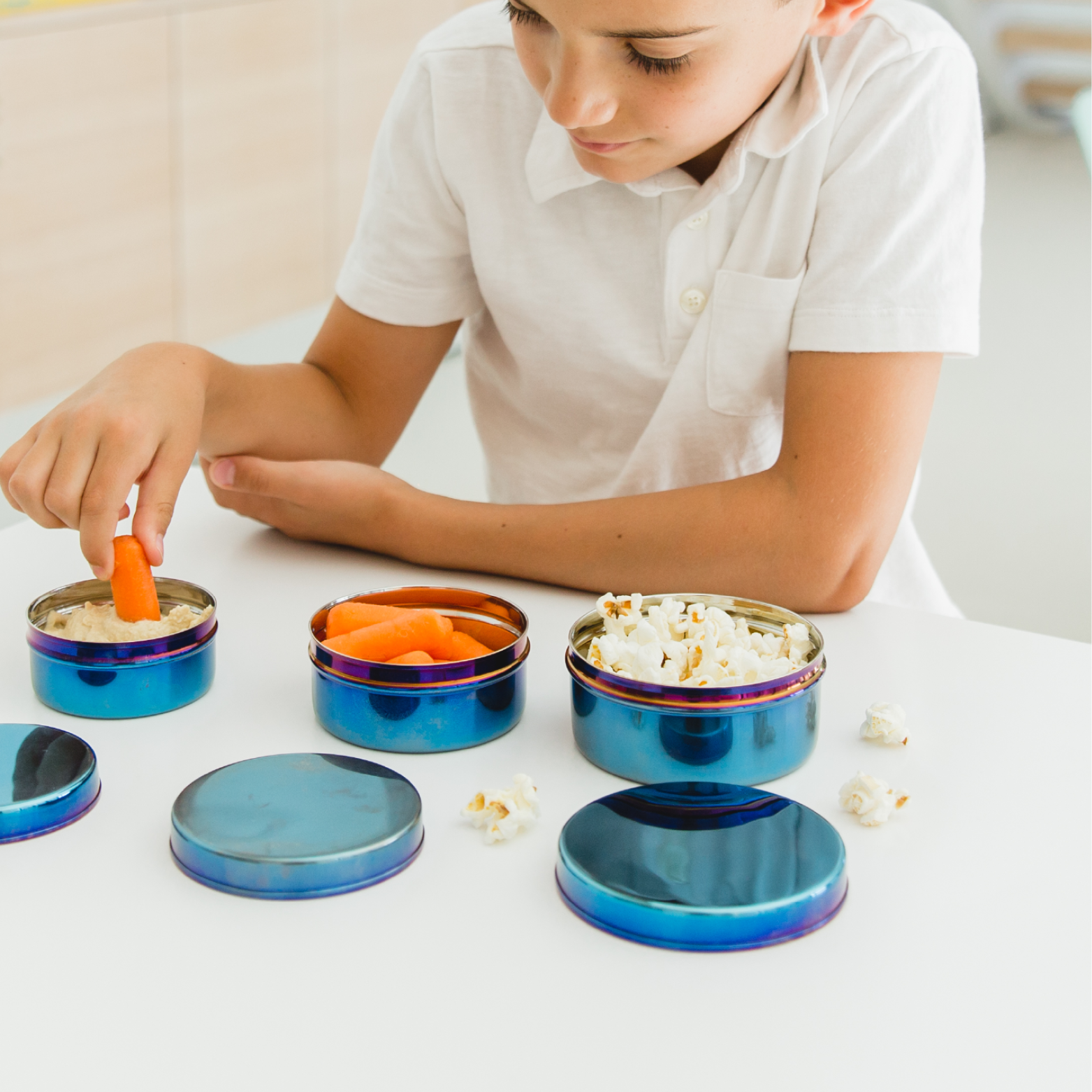 Doctor-designed colorful containers made with 100% recycled steel and without harmful plastic chemicals. Designed to nest, stack and store so you can move your meal with you — wherever you dine. 