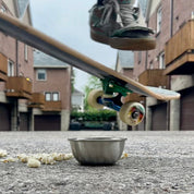 Skateboard about to hit 12 ounce stainless teel bowl - durable, long-lasting bowl