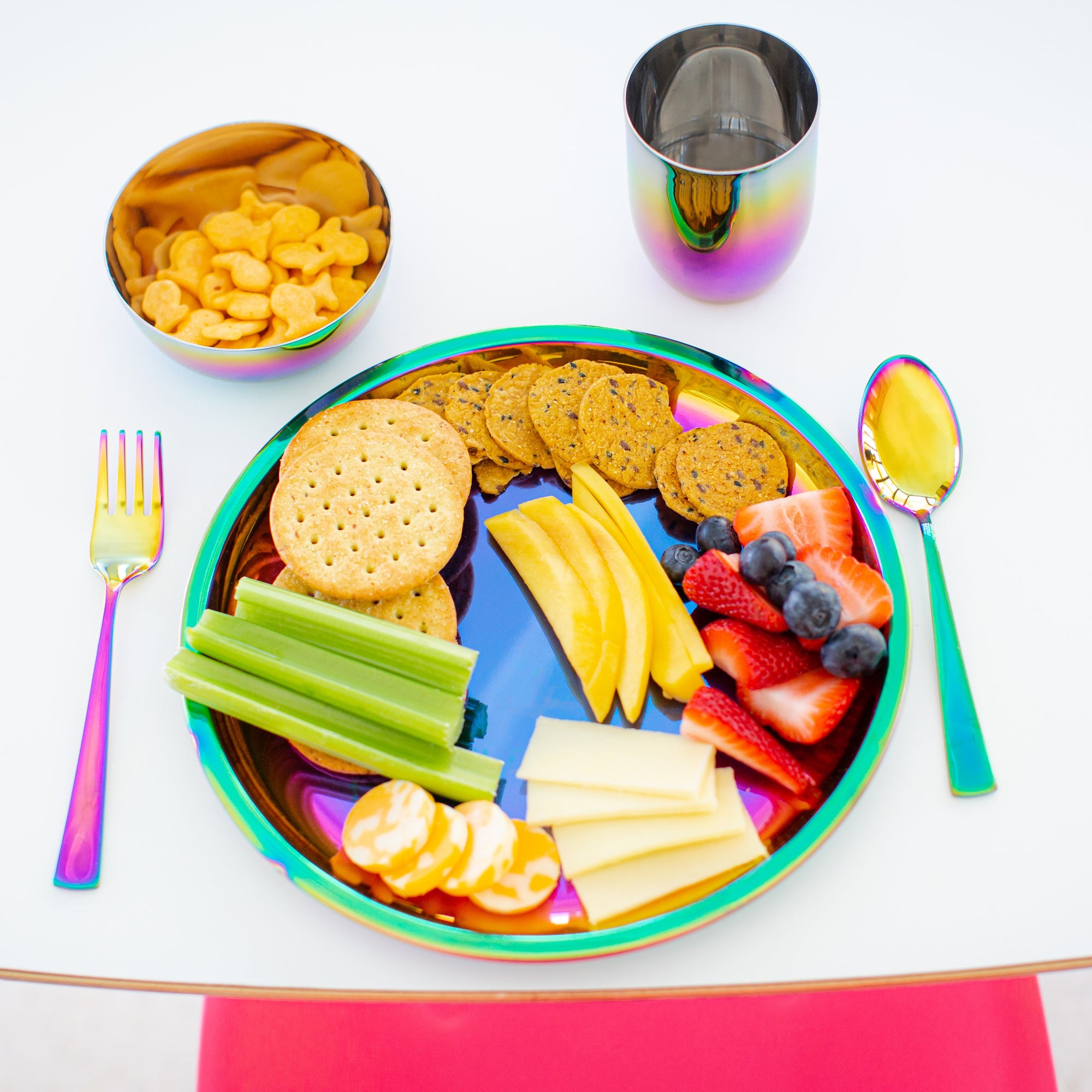 Rainbow purposeful 9 inch round plate, cutlery and conscious 8 oz cup for the family. Stainless steel and titanium - eco-friendly. Our dishes keep kids' healthy food healthy.