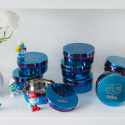Blue stainless steel food containers with Smurf designs on the lids for toddlers, kids, and adults