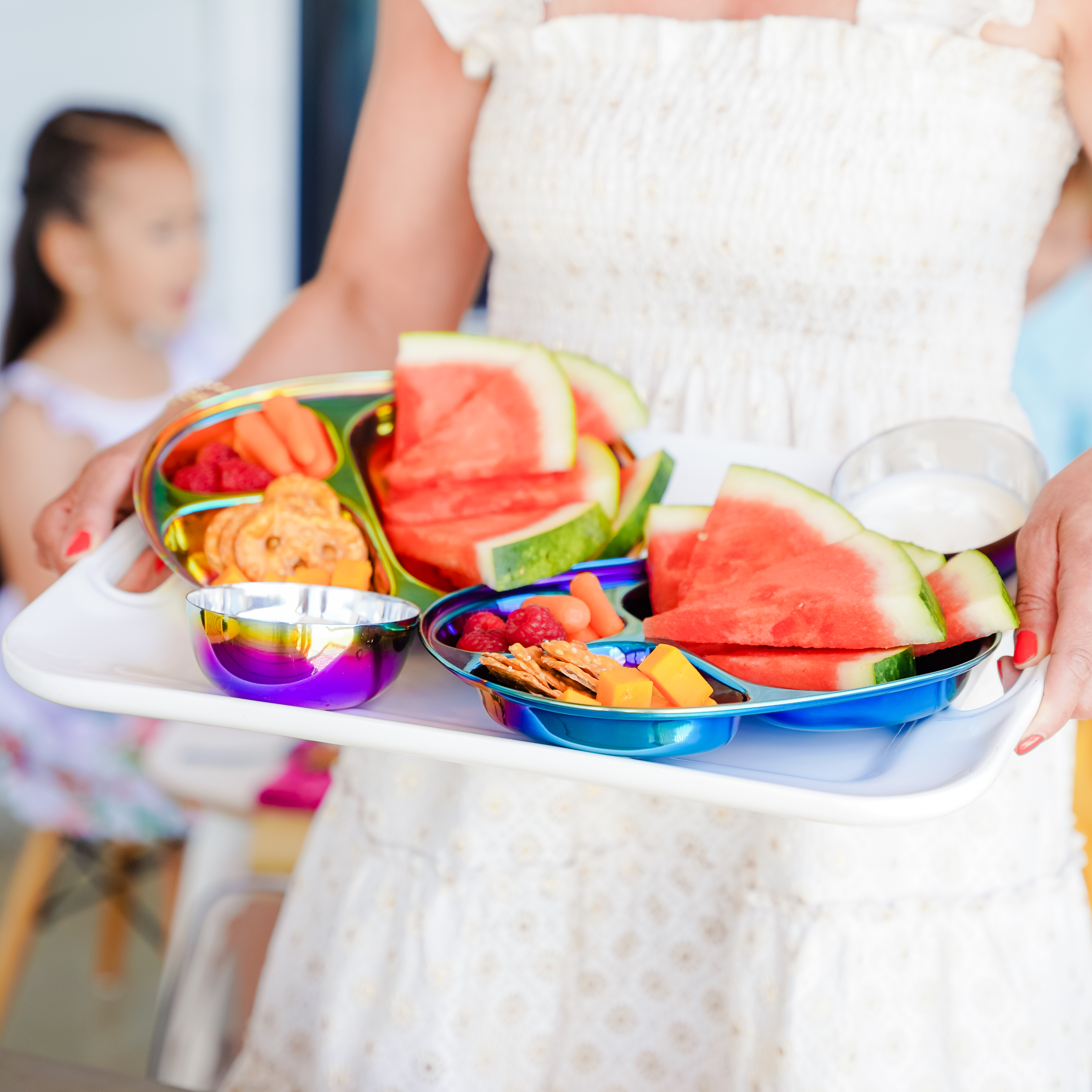 Ahimsa stainless steel toddler plates for kids with fruit and snacks on a tray   